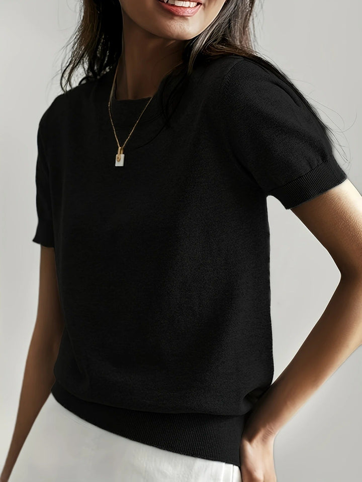 Chic women's short sleeve knit tee, crew neck. An effortless top for a polished casual look.
