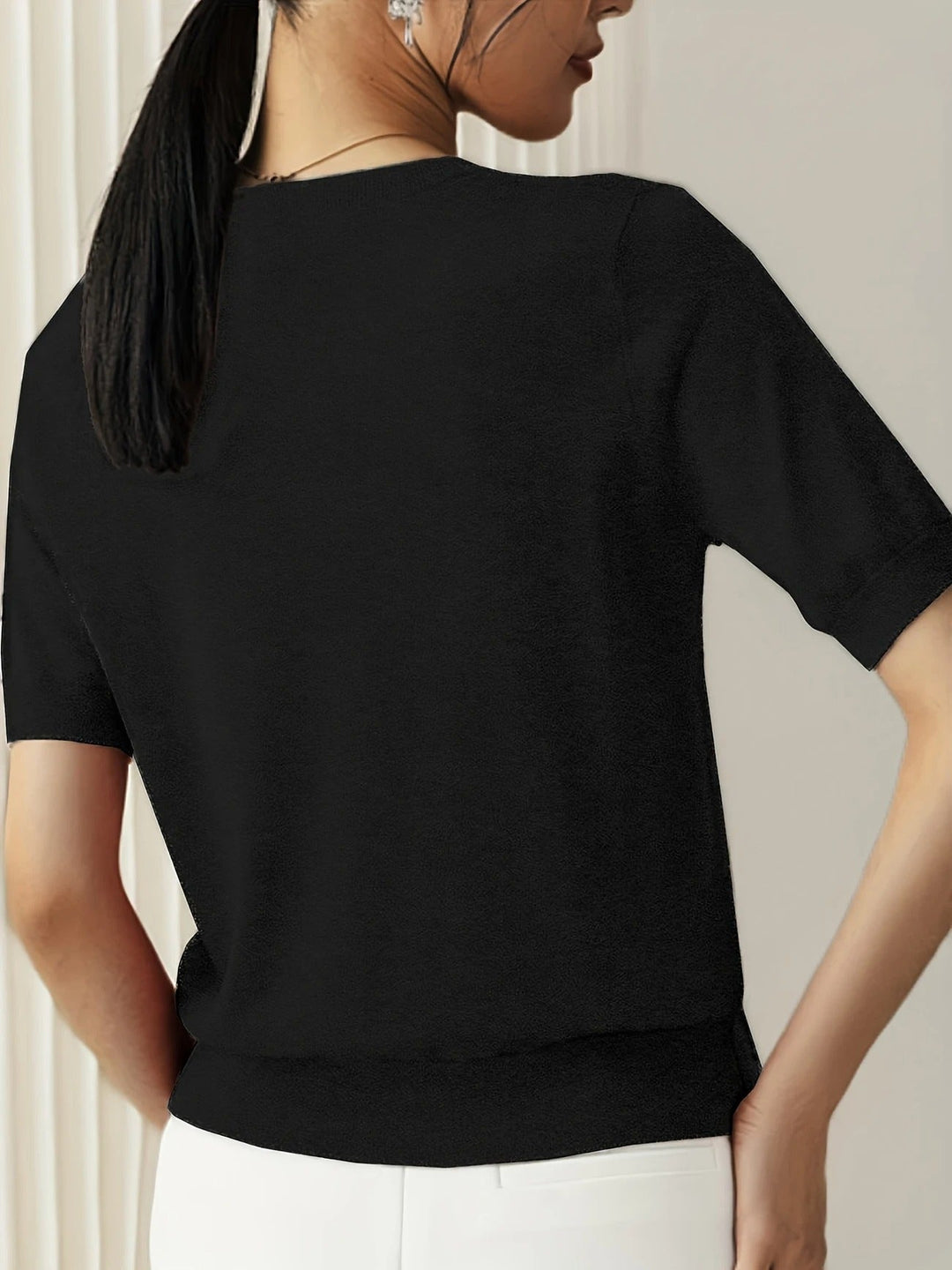 Fashionable women's short sleeve crew neck knit tee. Perfect casual top with an elevated feel.