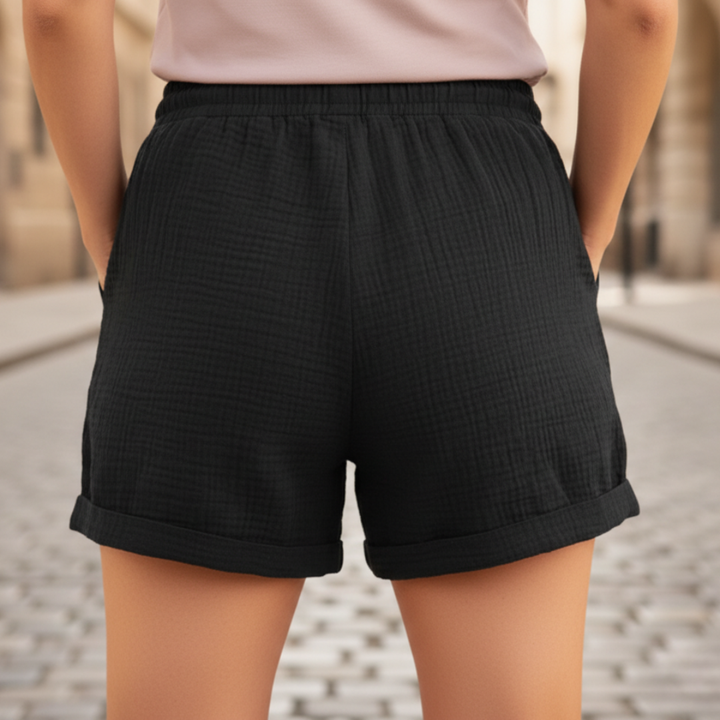 Comfortable women's casual shorts with drawstring waist and practical patch pockets for warm weather.
