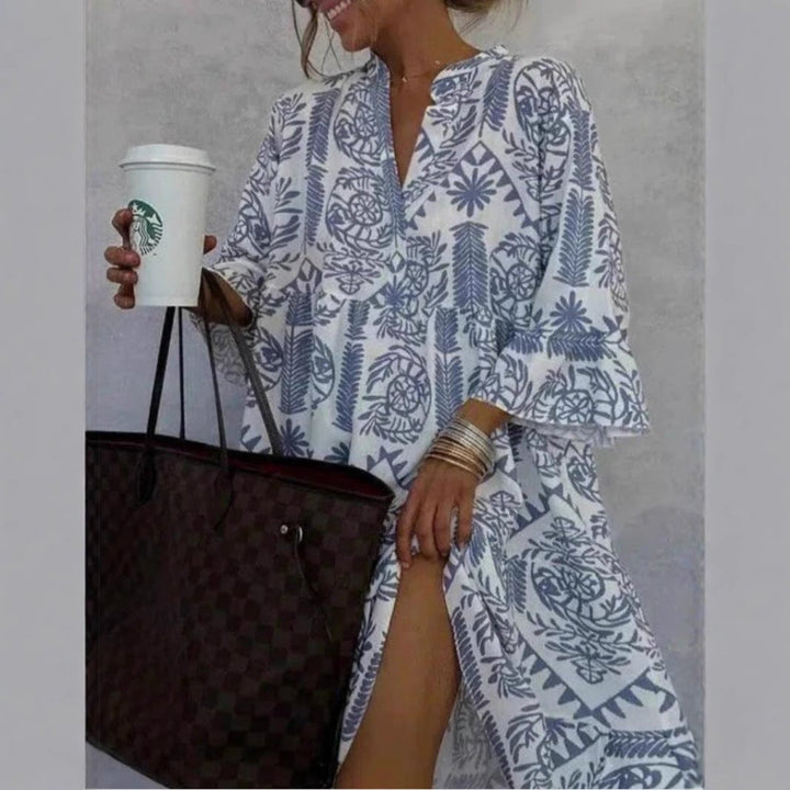 Casual women's floral tiered sundress, comfortable boho print dress, great for warm weather.