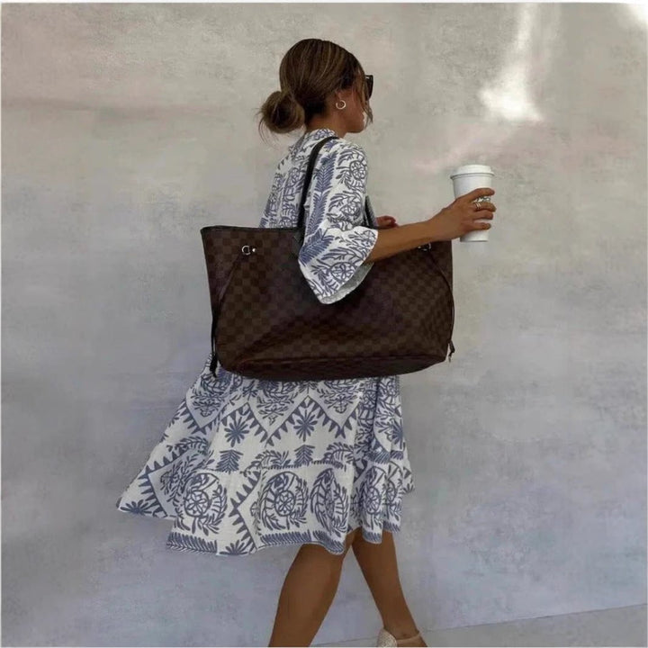 Effortless women's floral sundress with a chic tiered boho design, a must-have for summer fashion.