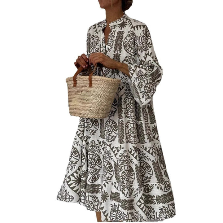 Vibrant floral print women's sundress, a flowing tiered casual dress in a relaxed boho style.