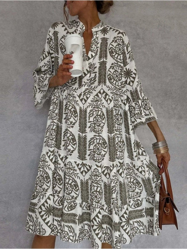 Comfortable women's tiered floral tunic sundress, perfect for warm weather resort and casual wear.