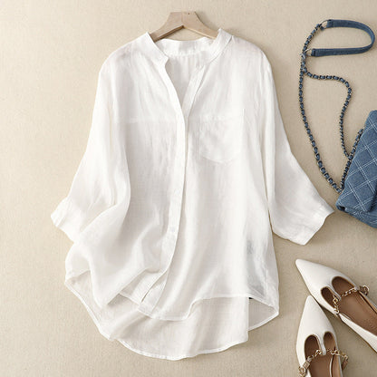 Casual women's white flowy button-down blouse. A versatile top for summer and everyday wear.