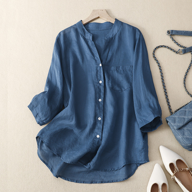 Relaxed fit sky blue women's summer shirt. Comfortable flowy button-down top for casual wear.
