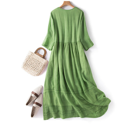 Green women's sleeveless flowy summer dress, comfortable and casual, ideal for warm weather elegant events.