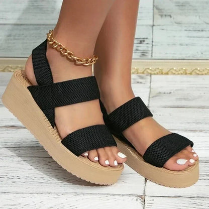 Lightweight women's open-toe flat sandals. Ideal for summer vacations & beachwear, offering all-day comfort.
