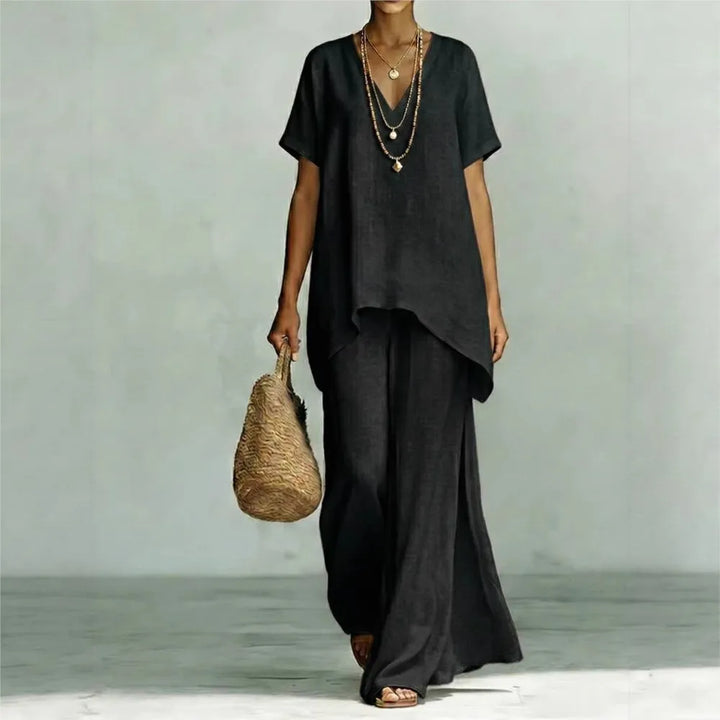 Versatile women's linen two-piece set, featuring an asymmetrical top & wide-leg pants, for stylish summer casuals.