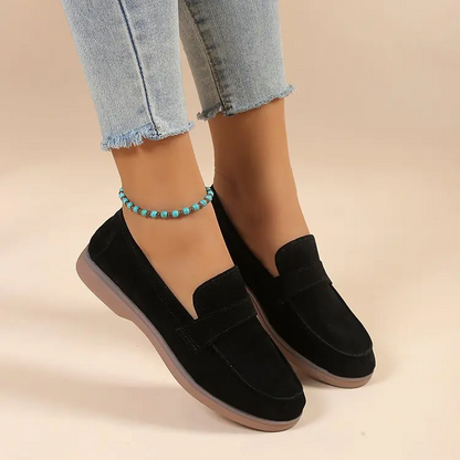 Green women's slip-on loafers with cushioned comfort, ideal for both casual and dressy outfits.