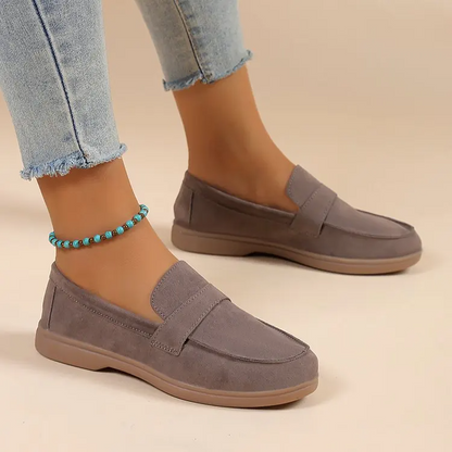 Green women's casual loafers, designed for everyday comfort and a chic, polished look.