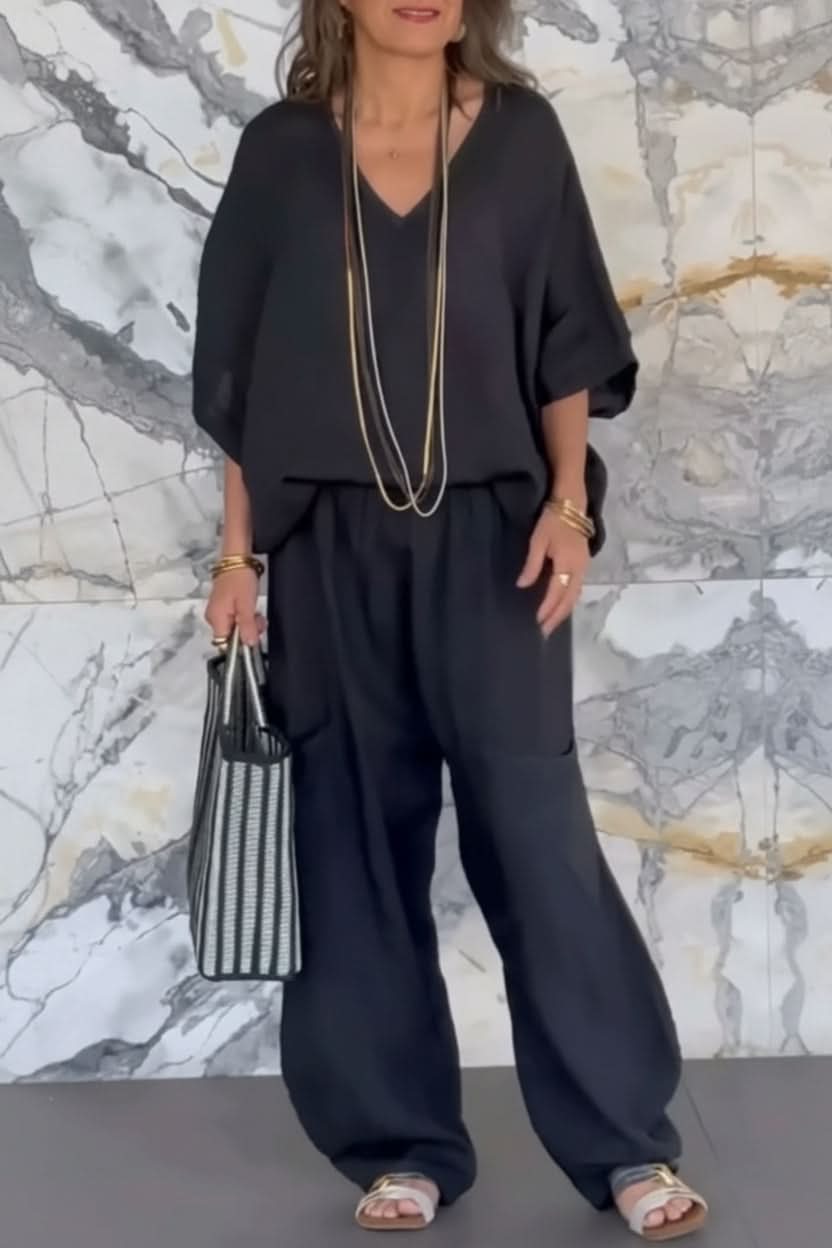 Comfortable women's open back pantsuit. This relaxed fit two-piece set is perfect as a stylish summer or travel outfit.