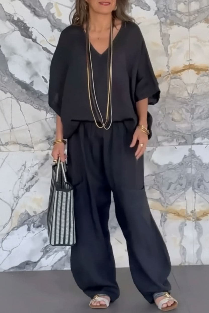 Comfortable women's open back pantsuit. This relaxed fit two-piece set is perfect as a stylish summer or travel outfit.