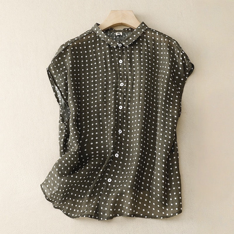 Women's effortless polka dot short sleeve top, a stylish and versatile casual shirt for everyday wear.