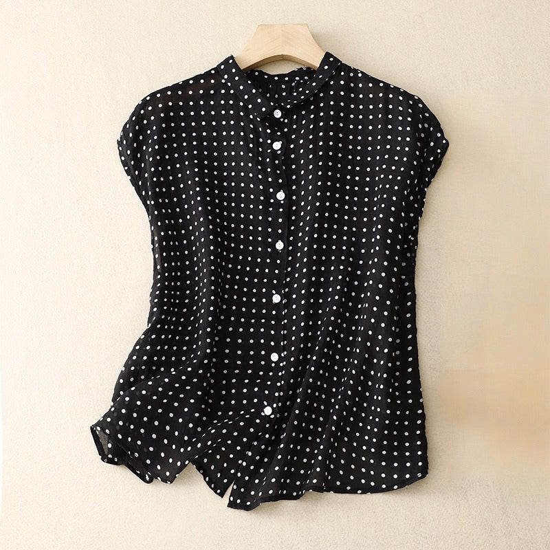 Green polka dot short sleeve top for women, featuring a relaxed fit perfect for stylish summer wear.