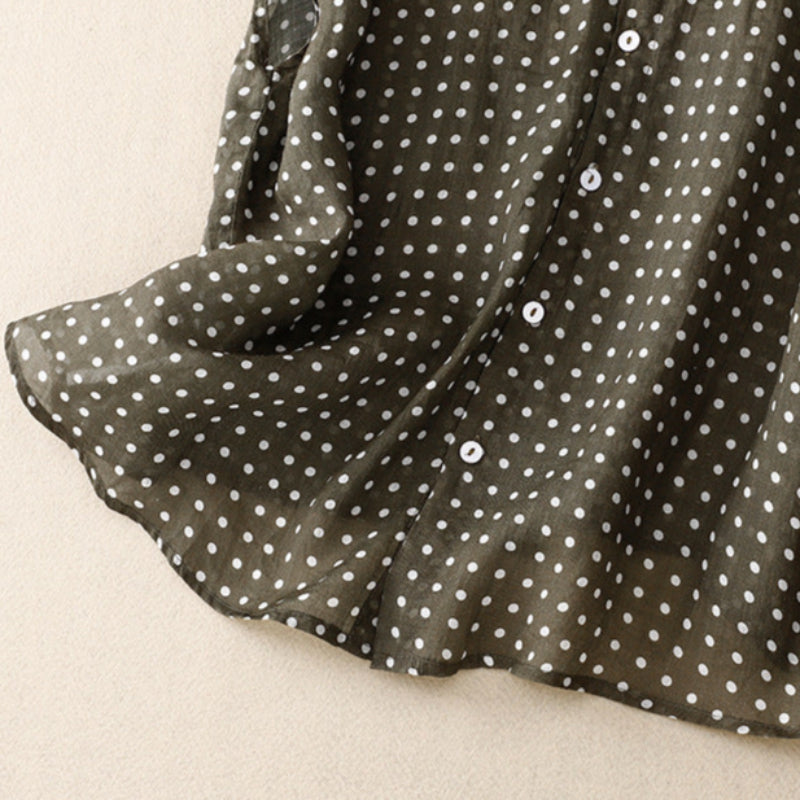 Elegant polka dot short sleeve top for women, a comfortable and stylish shirt perfect for everyday chic.