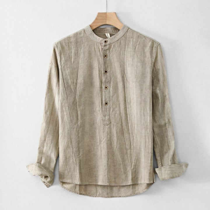 Effortless women's long sleeve henley shirt. Relaxed fit, button neck, solid color for versatile casual fashion.