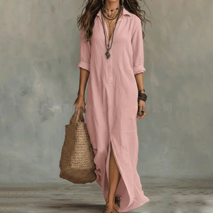 Elegant women's casual maxi dress featuring 3/4 sleeves, side splits & half-button detail. Everyday style.