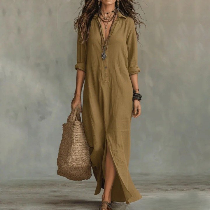 Effortless women's maxi dress with 3/4 sleeves & side split. Comfortable & versatile for summer casual wear.