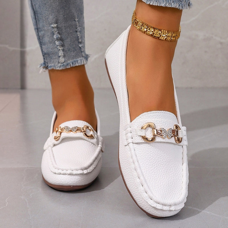 Chic women's loafers with unique detail, offering effortless slip-on comfort and style.