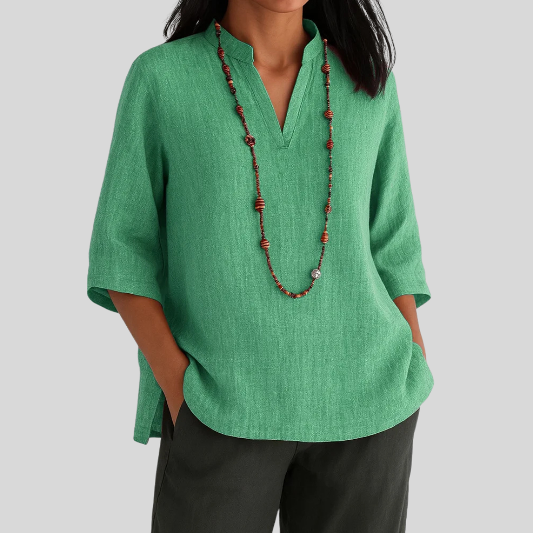 Women's effortless V-neck 3/4 sleeve casual blouse in a relaxed fit, perfect for everyday wear.