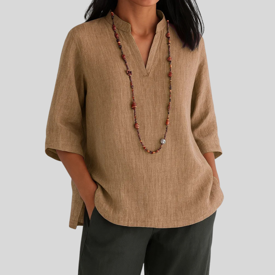 Relaxed fit V-neck women's blouse with 3/4 sleeves, a versatile casual top for effortless style.