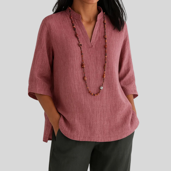 Elegant & comfortable women's V-neck 3/4 sleeve blouse. A fashionable solid color top for any casual occasion.
