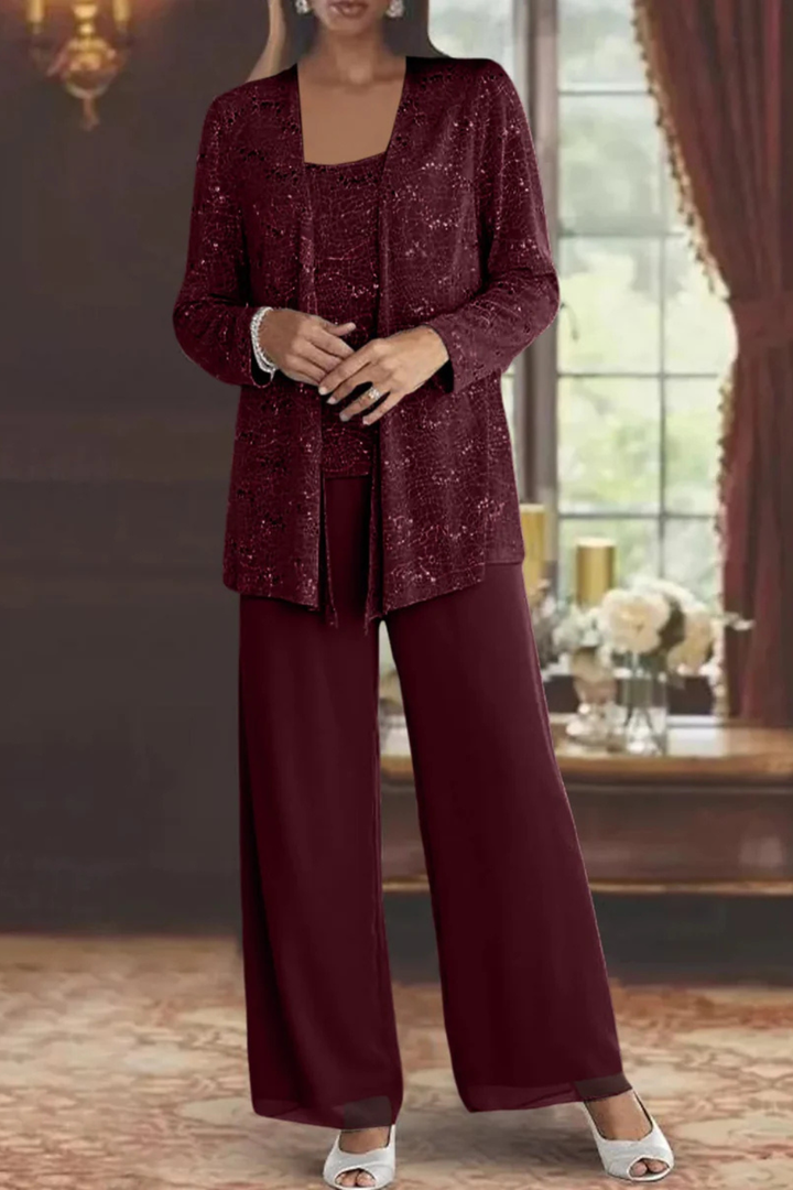 Stylish women's three-piece formal evening wear, showcasing a beautiful flowing silhouette.