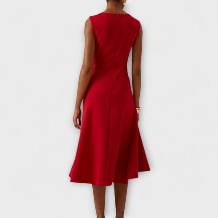 Sophisticated women's sleeveless asymmetric midi dress. Perfect for evening wear, parties, and special occasions.
