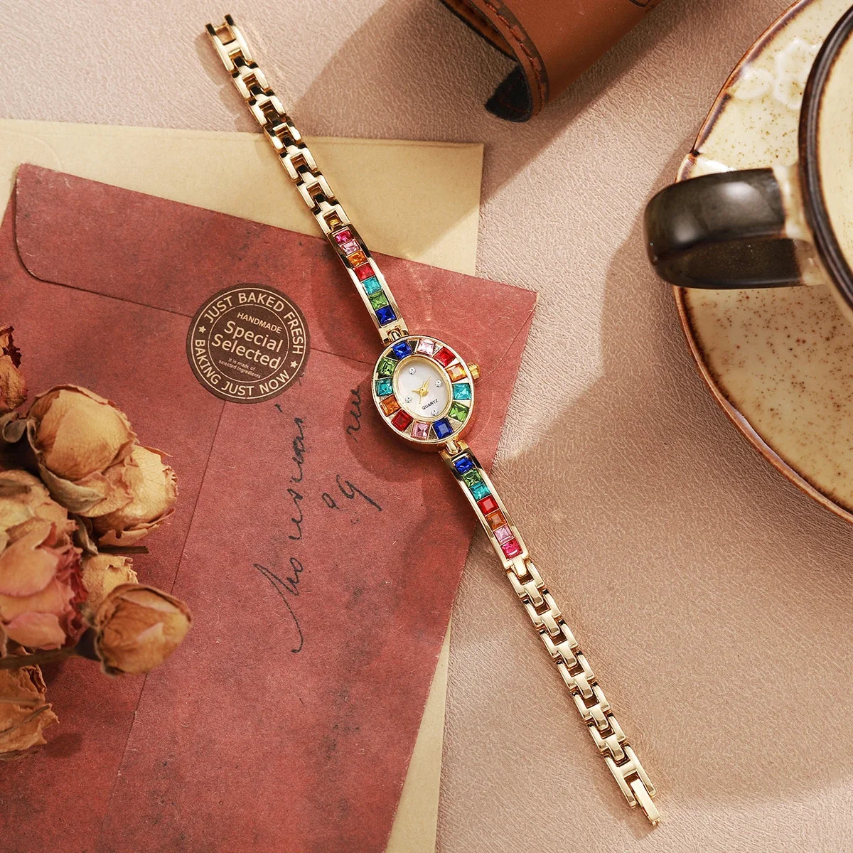 Sophisticated rose gold Aurora gemstone watch for women, featuring an elegant oval dial and durable design.