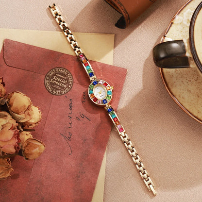 Sophisticated rose gold Aurora gemstone watch for women, featuring an elegant oval dial and durable design.