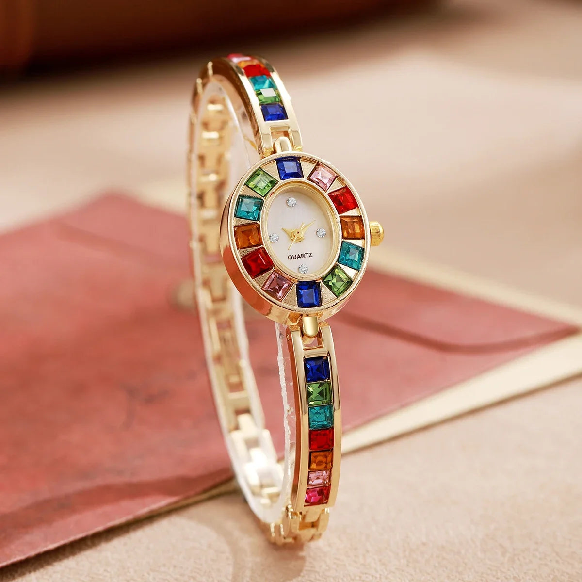 Chic silver women's elegant Aurora gemstone watch with an oval dial, a timeless and scratch-resistant accessory.