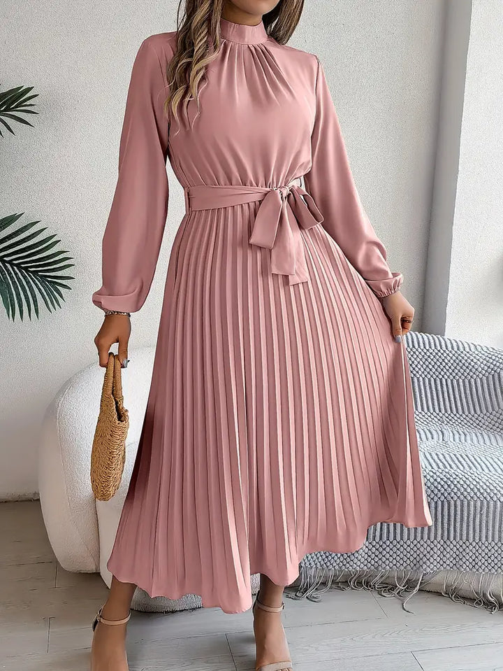 Sophisticated women's belted dress, midi length, with elegant pleats & long sleeves.