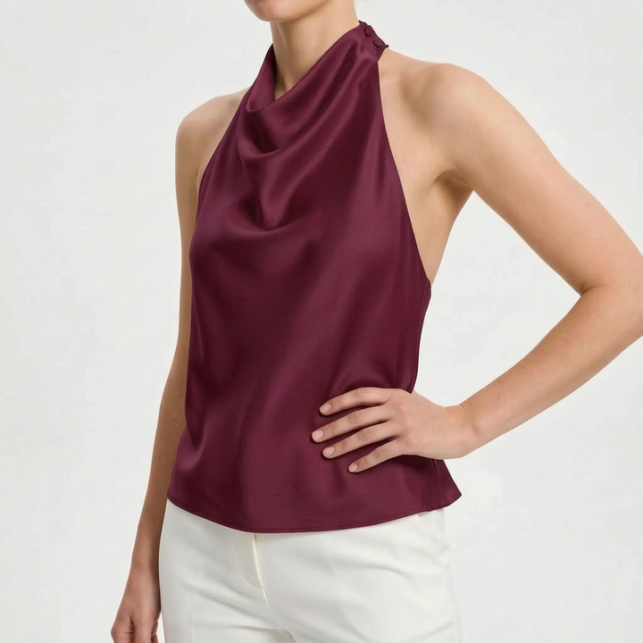 Dressy women's clothing: a solid draped halter top, backless, ideal for a chic evening or summer event.