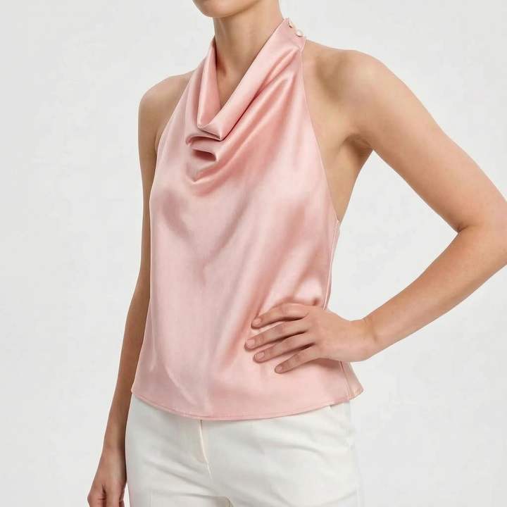 Polished women's backless halter top, featuring a beautiful draped neckline, ideal for dressy occasions.