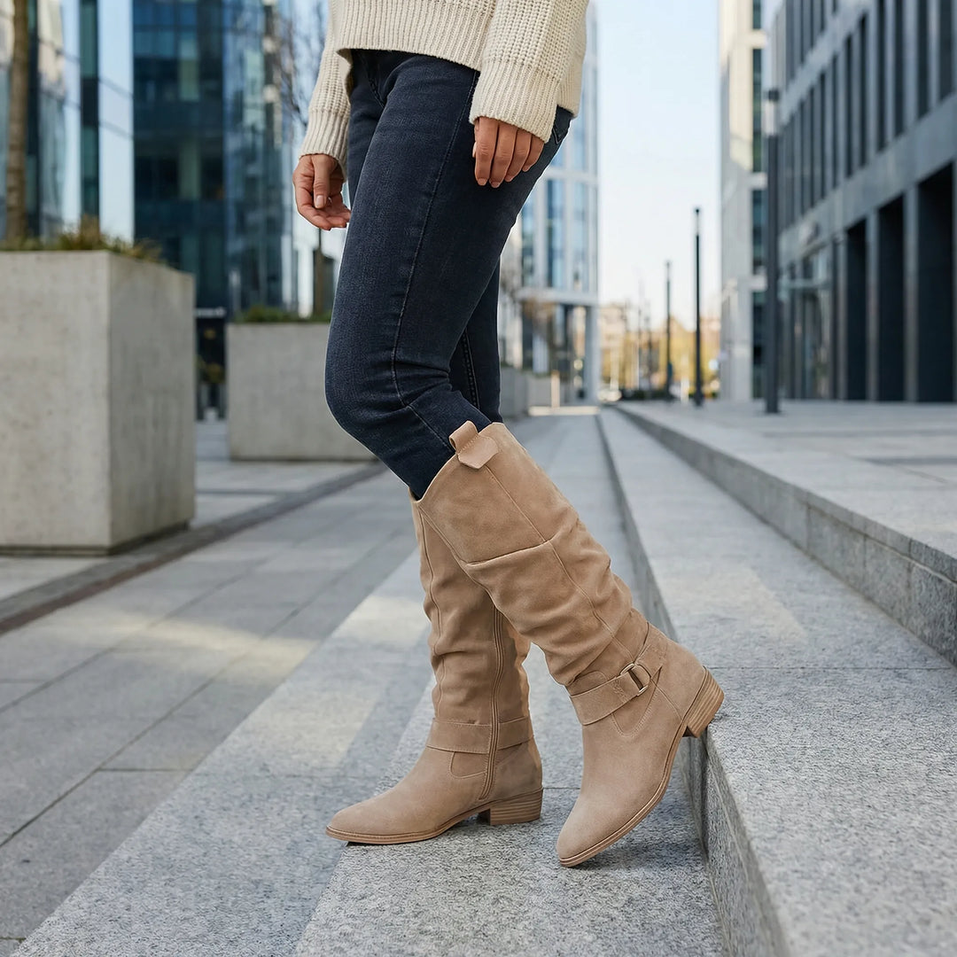 Women's elegant black knee-high boots with side zipper and comfortable block heel for fall/winter fashion.