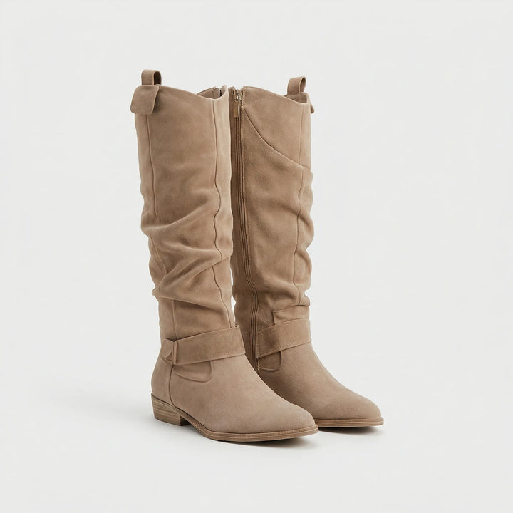Chic women's knee-high boots in classic style, perfect elegant footwear for autumn and winter outfits.