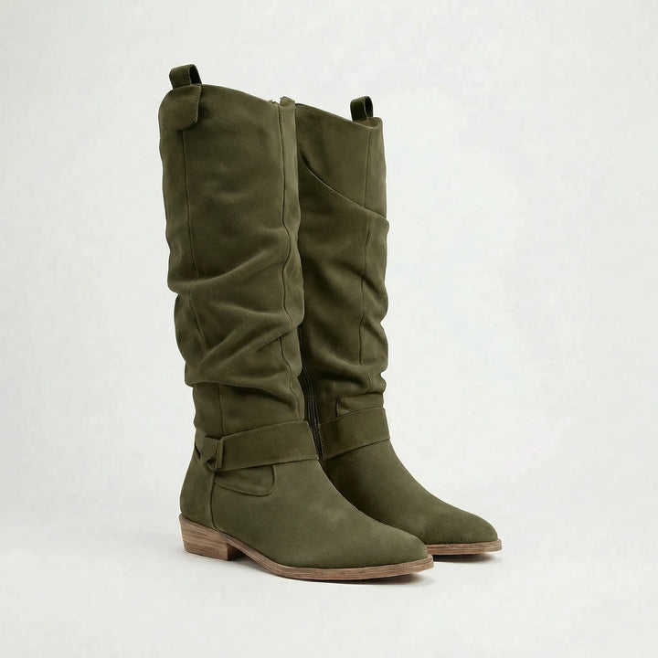 Stylish women's black knee-high boots, an elegant footwear choice for fall fashion, with a sleek design.