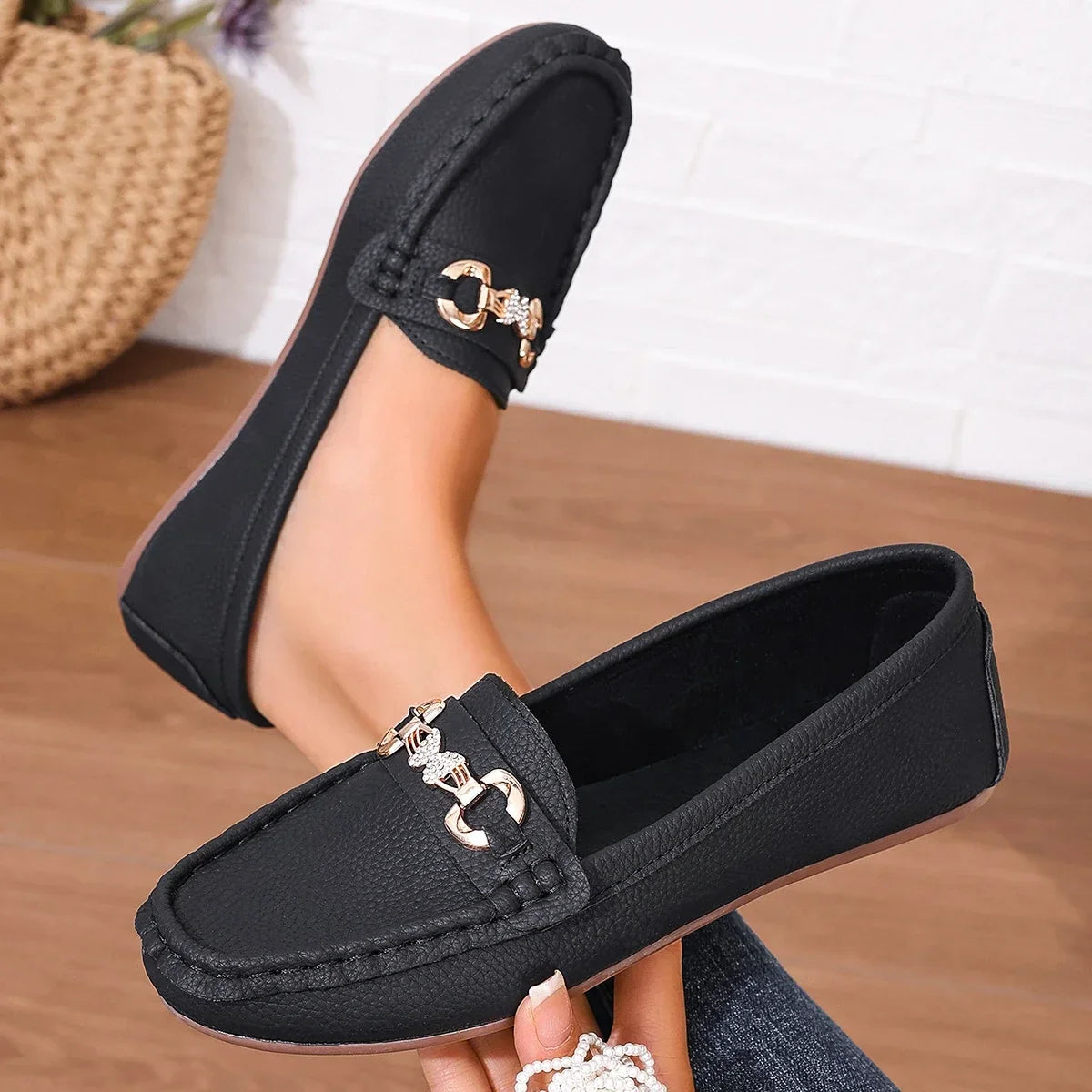 Dress up your look with these women's elegant loafers, crystal chain accent.
