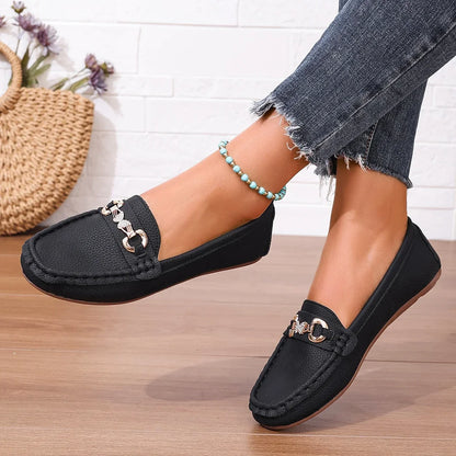 Modern women's loafers, comfortable and stylish with a shimmering crystal chain.