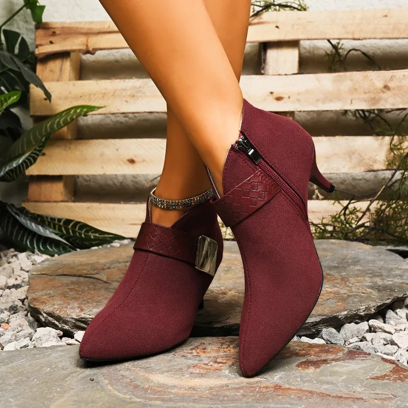 Women's black pointed fashion footwear, offering elegant style and cushioned support for feet.