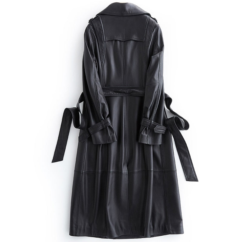 Chic black long trench coat for women, versatile fall fashion & spring jacket, ideal for elegant outerwear styles.