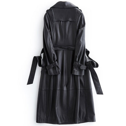 Chic black long trench coat for women, versatile fall fashion & spring jacket, ideal for elegant outerwear styles.