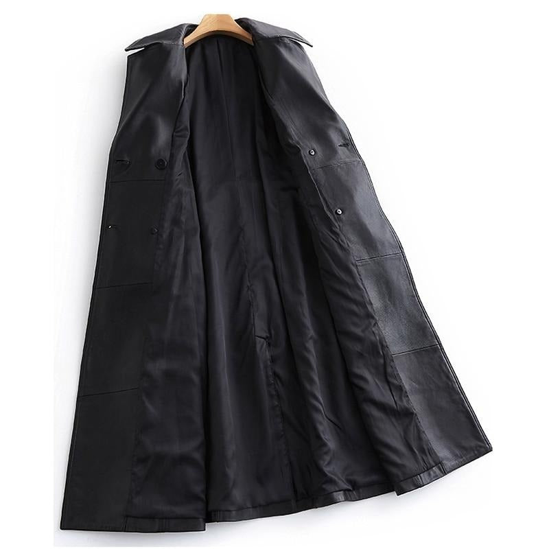 Elegant women's black trench coat, a long classic outerwear piece with chic style, perfect for versatile fashion.