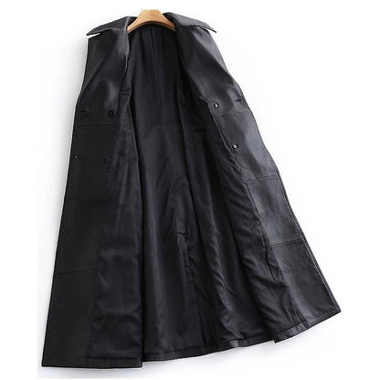 Elegant women's black trench coat, a long classic outerwear piece with chic style, perfect for versatile fashion.