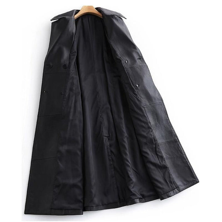 Elegant women's black trench coat, a long classic outerwear piece with chic style, perfect for versatile fashion.