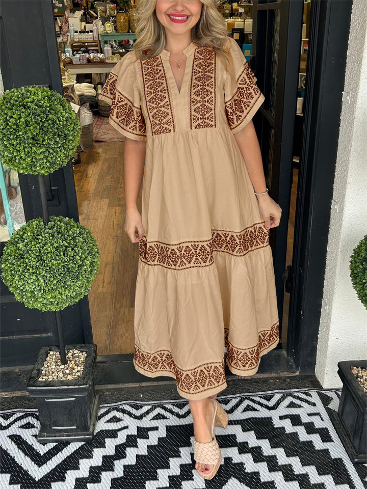 Versatile women's boho midi dress with embroidery, suitable for both casual and elegant spring/summer events.