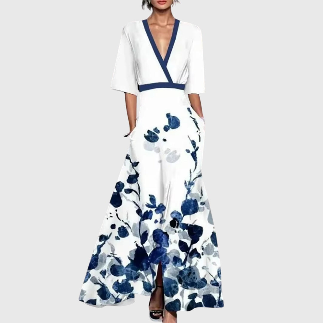 Women's elegant bold floral deep V-neck flowy maxi dress, perfect for summer parties or wedding guests.