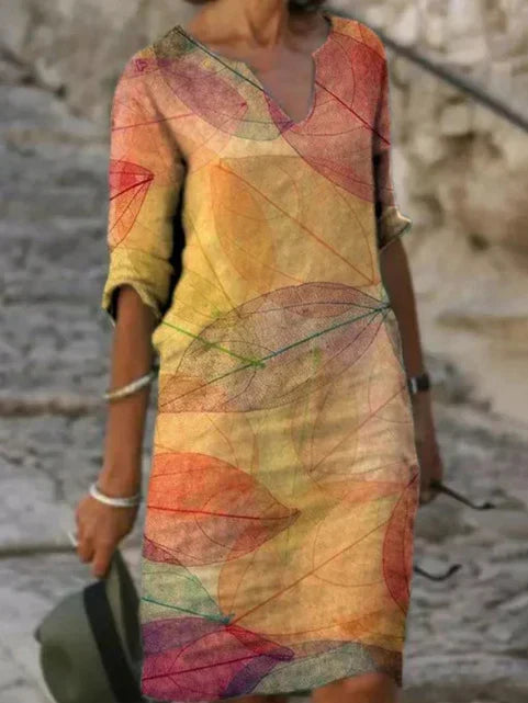 Casual women's botanical print midi dress, elegant short sleeve floral V-neck for everyday style.