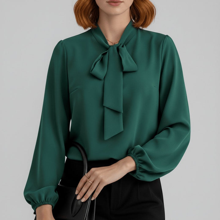 Chic women's puff sleeve blouse featuring a stylish bow tie neck, ideal for workwear and fashion.