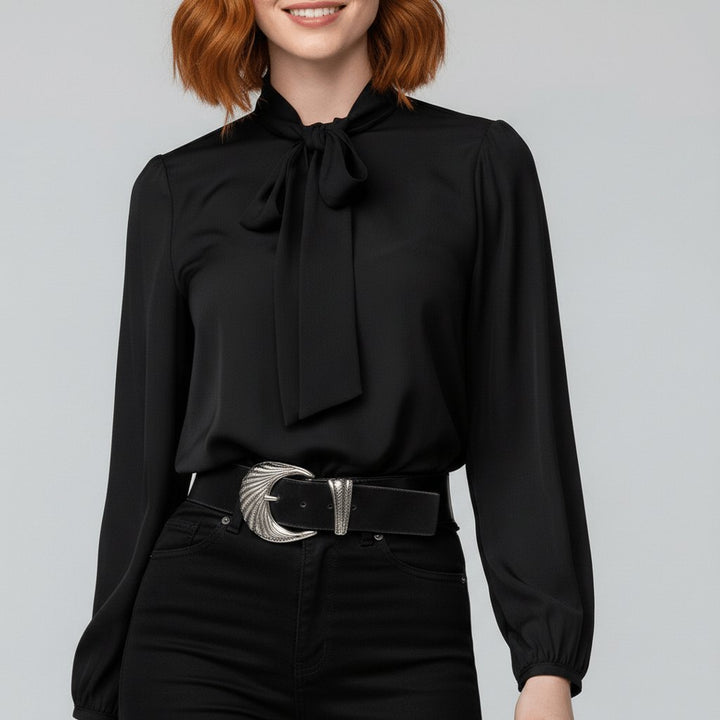 Versatile women's long sleeve blouse with a delicate bow tie and puff sleeves, suitable for office or special events.